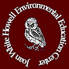 Logo of the Joan White Howell environmental Education Center..a painted owl encircled by the words Joan White Howell Enviornmental Education Center