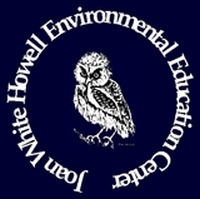 The logo of the Joan White Howell Environmental Education Center.  At its center is a painting of and owl by Dorthy Weddle, the mother of Gordon Weddle who was the Director of Clay Hill Memorial Forest for 22 years.